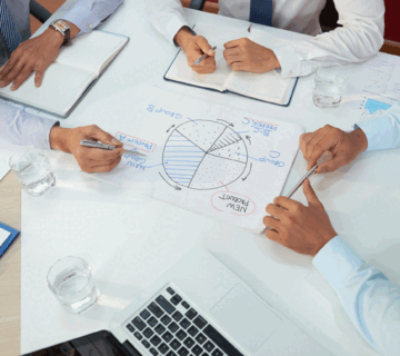 Business executives having meeting 360x320