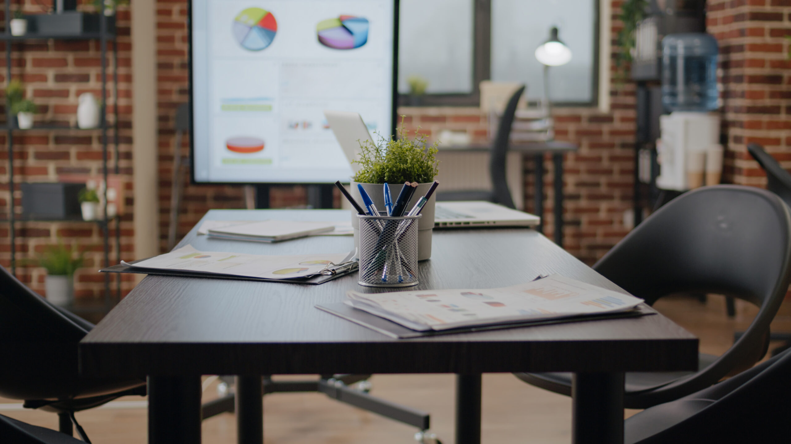 Close up of meeting table and monitor in business 2023 11 27 05 22 50 utc scaled